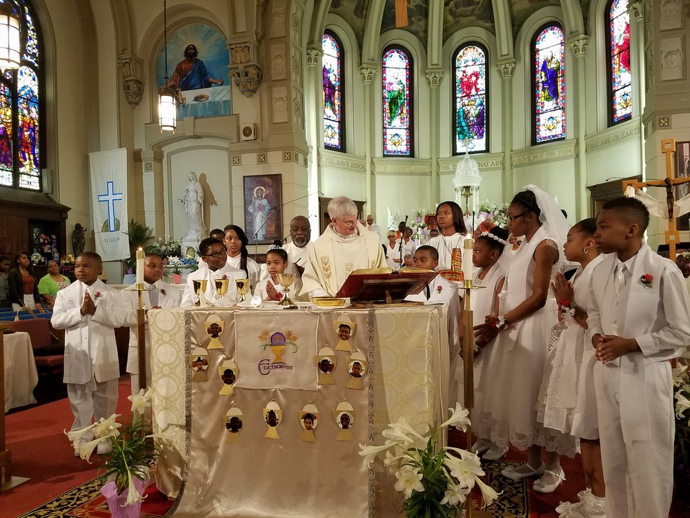 Interior of St. Bernardine church with young parishioners