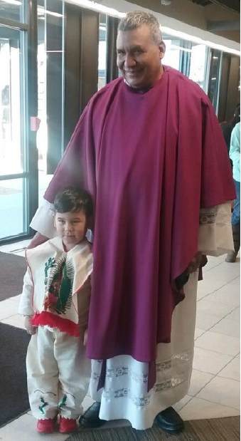 Padre Hilario with young parishioner