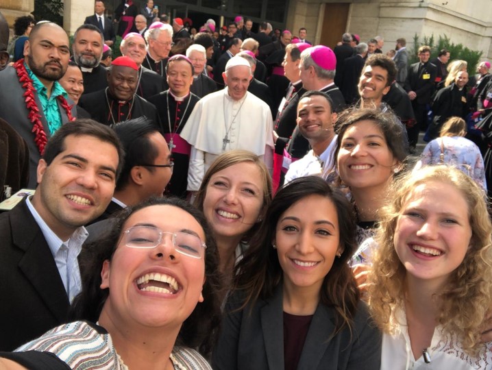 Crowd of happy people around Pope Francis embody the spirit of the synod