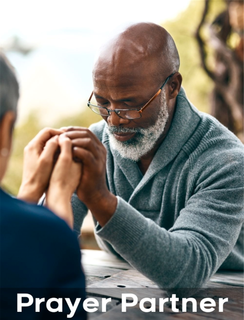 Two men praying together