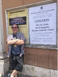 Chris Youstra by concert poster in Rome