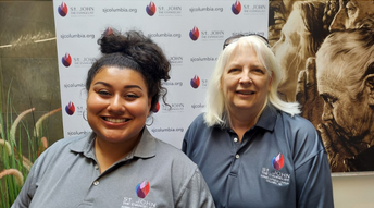 Staff members with logo shirts