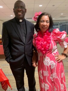 Fr. Ferdinand and parishioner during Diversity event