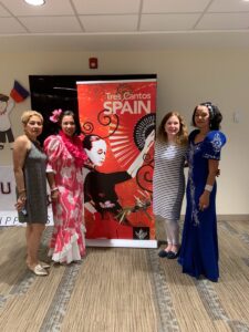 Participants at Diversity event by Spain poster